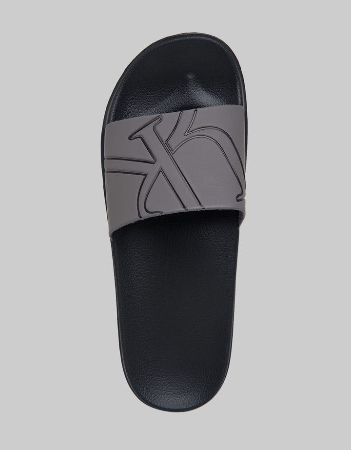Yongki Komaladi Sandals Print Logo