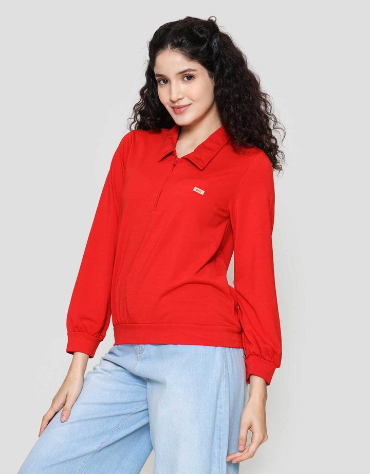 Exit Ila Kaos Wanita