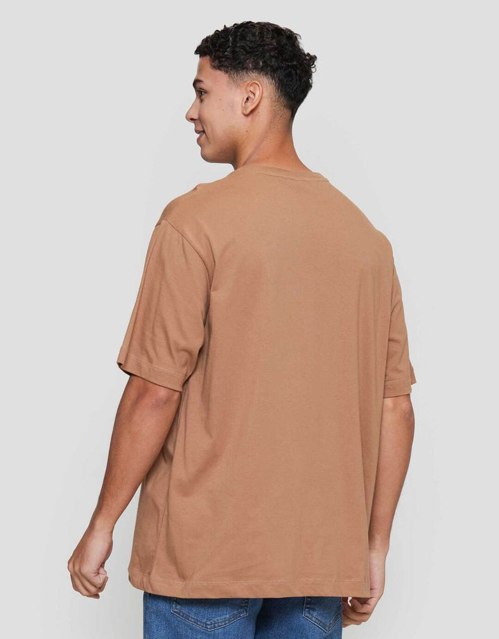 Cole Graphic Puff Stich Kaos Pria