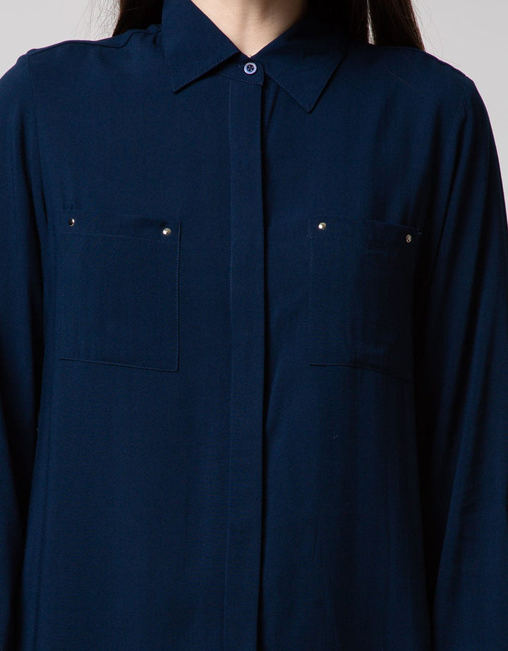 Details Kemeja Rivet