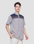 Intresse Capricornia Baju Koko Pria