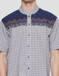 Intresse Capricornia Baju Koko Pria