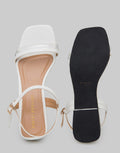Yongki Komaladi Sepatu Hak Women
