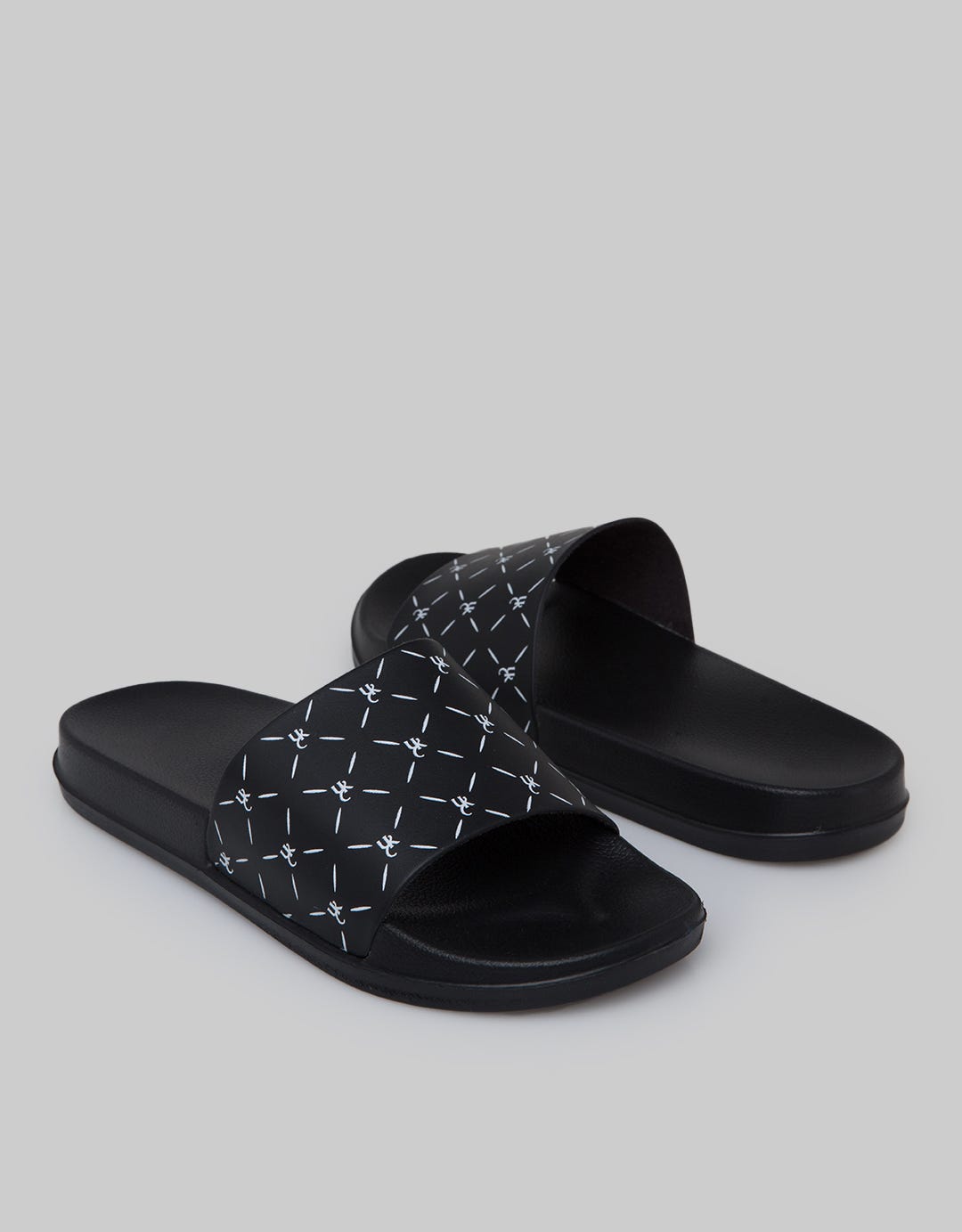 Yongki Komaladi Sandals Single Strap Motif