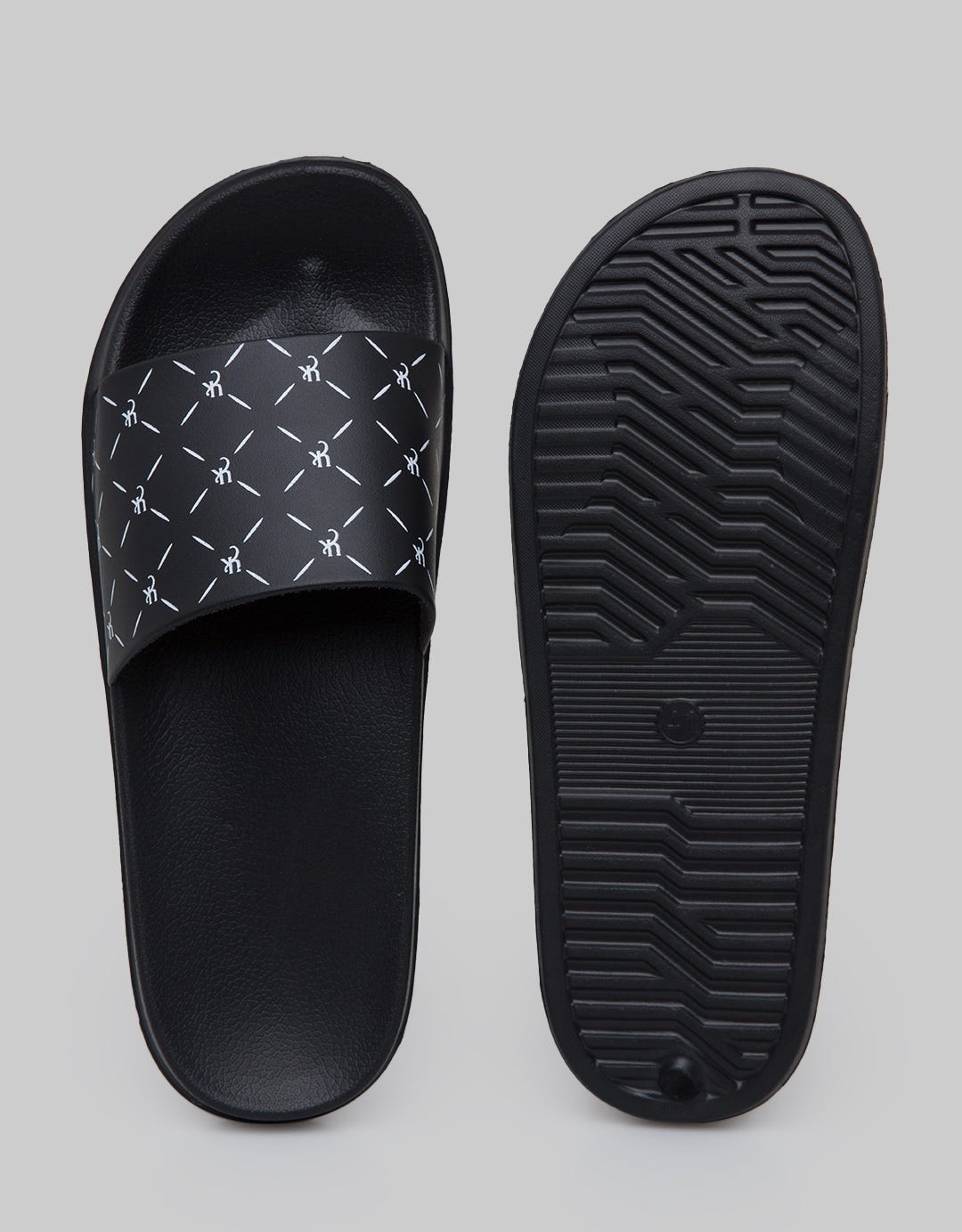 Yongki Komaladi Sandals Single Strap Motif