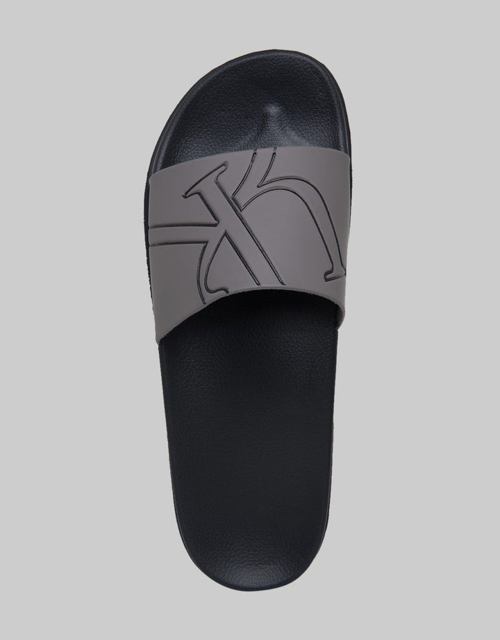 Yongki Komaladi Sandals Print Logo