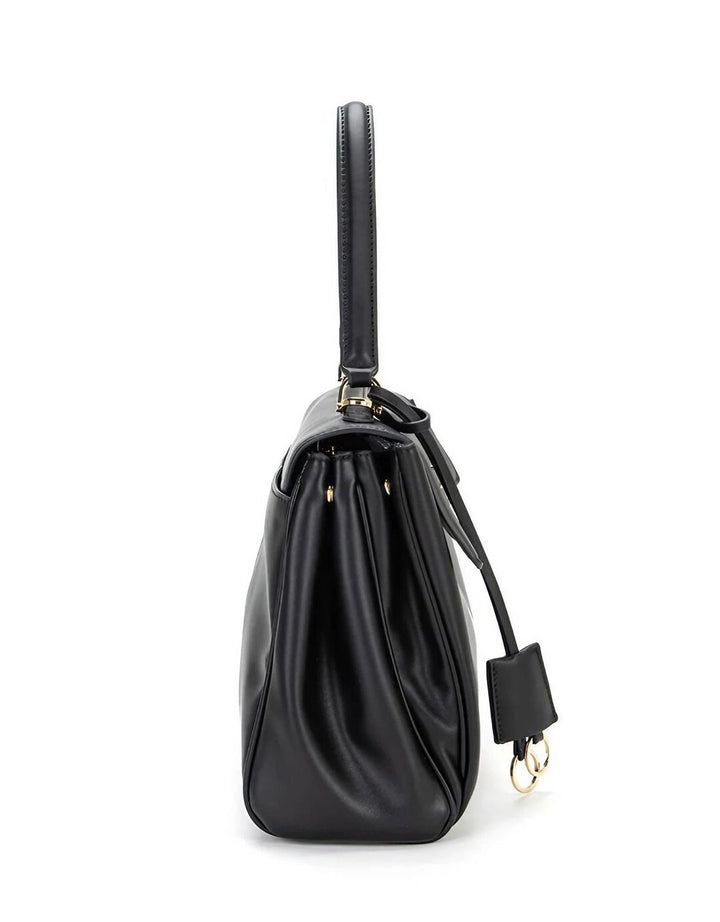 Palomino Nioda Tas Tangan Solid Wanita