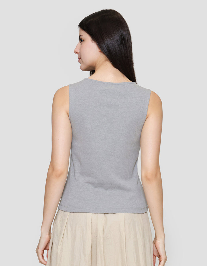 Suko Sleeveless Slit Kerah Bulat Tanpa Lengan Kaos Wanita