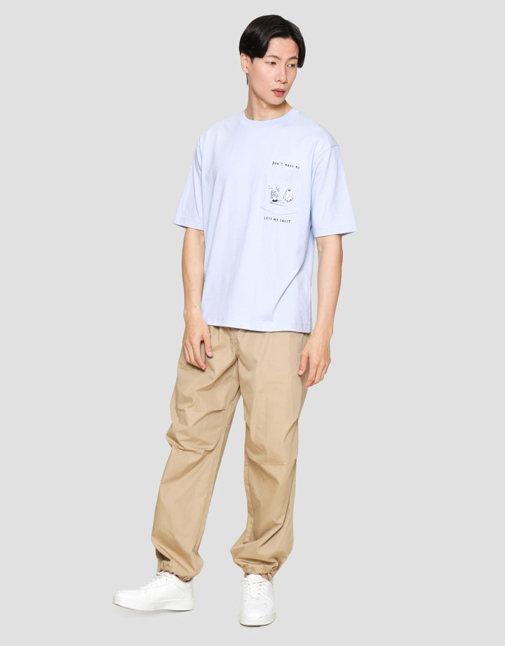 Suko Oversized Graphic Pocket Kerah Bulat Kaos Lengan Pendek Pria