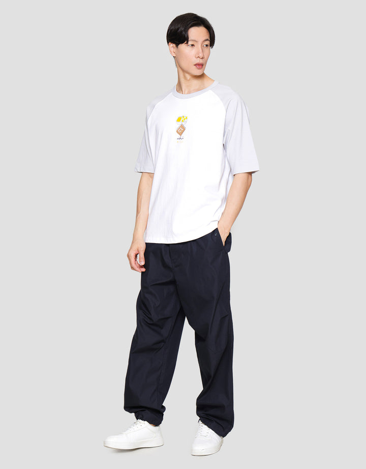 Suko Graphic Raglan Kaos Lengan Pendek Pria