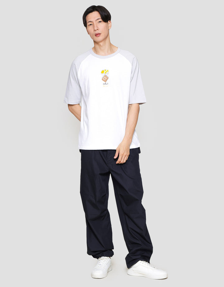 Suko Graphic Raglan Kaos Lengan Pendek Pria