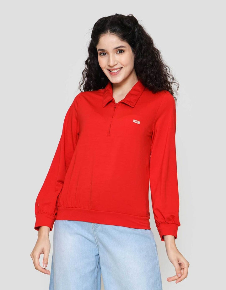 Exit Ila Kaos Wanita