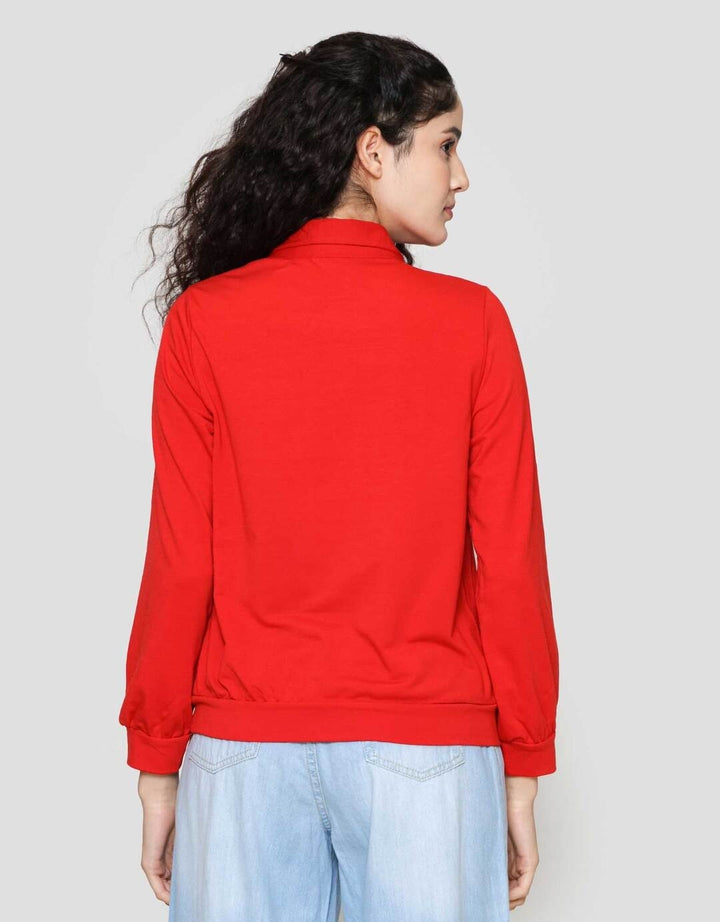 Exit Ila Kaos Wanita