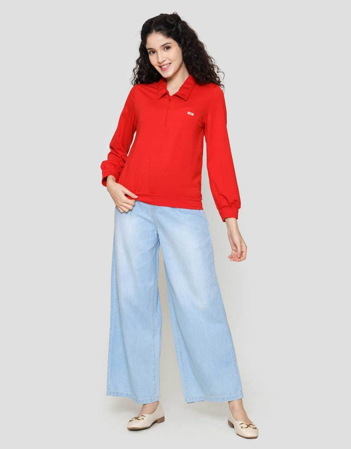 Exit Ila Kaos Wanita