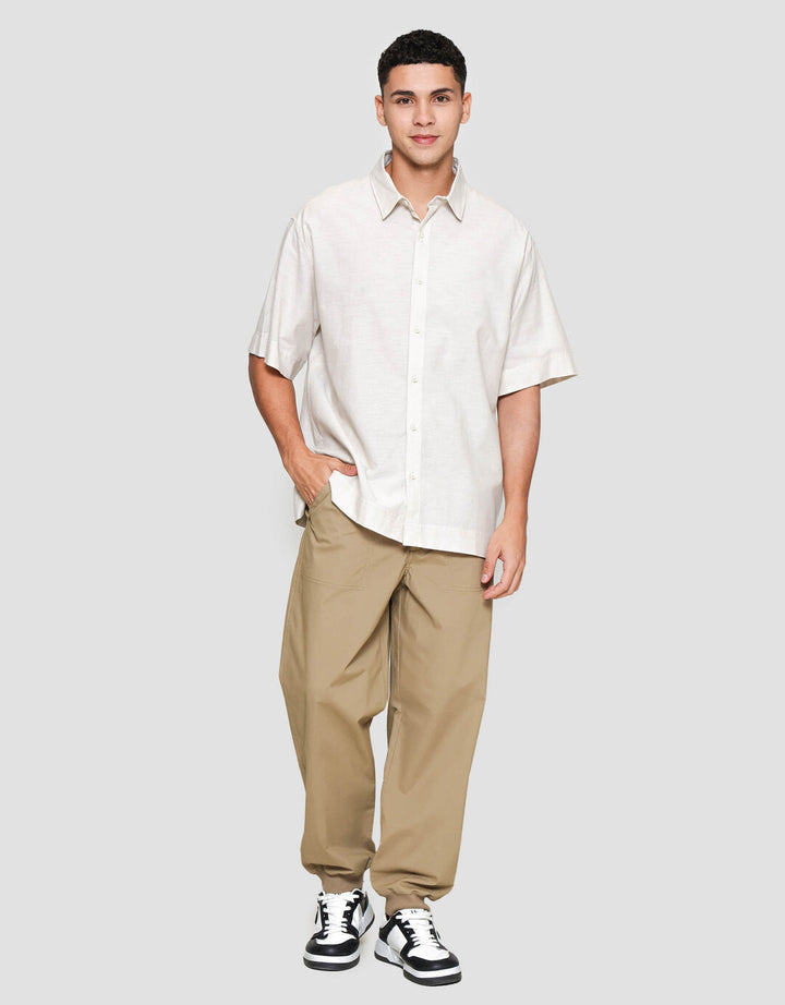 Suko Oversized Linen Non Pocket Solid Kemeja Lengan Pendek Pria