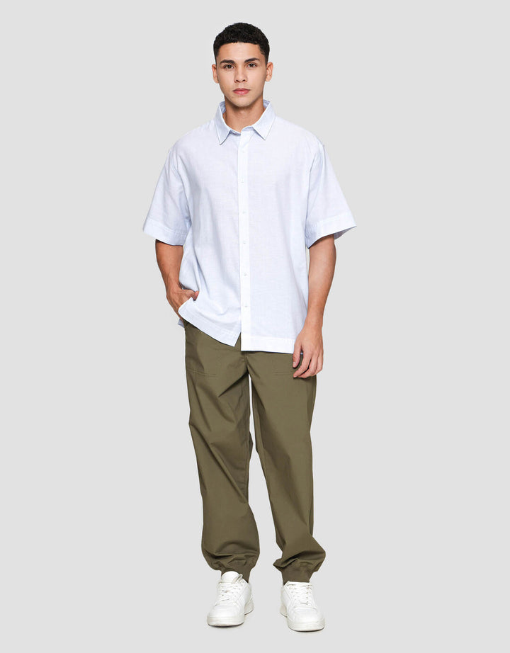 Suko Oversized Linen Non Pocket Solid Kemeja Lengan Pendek Pria