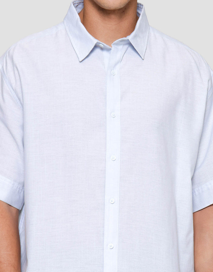 Suko Oversized Linen Non Pocket Solid Kemeja Lengan Pendek Pria