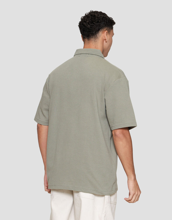 Nevada Plain Texture Polo Pria