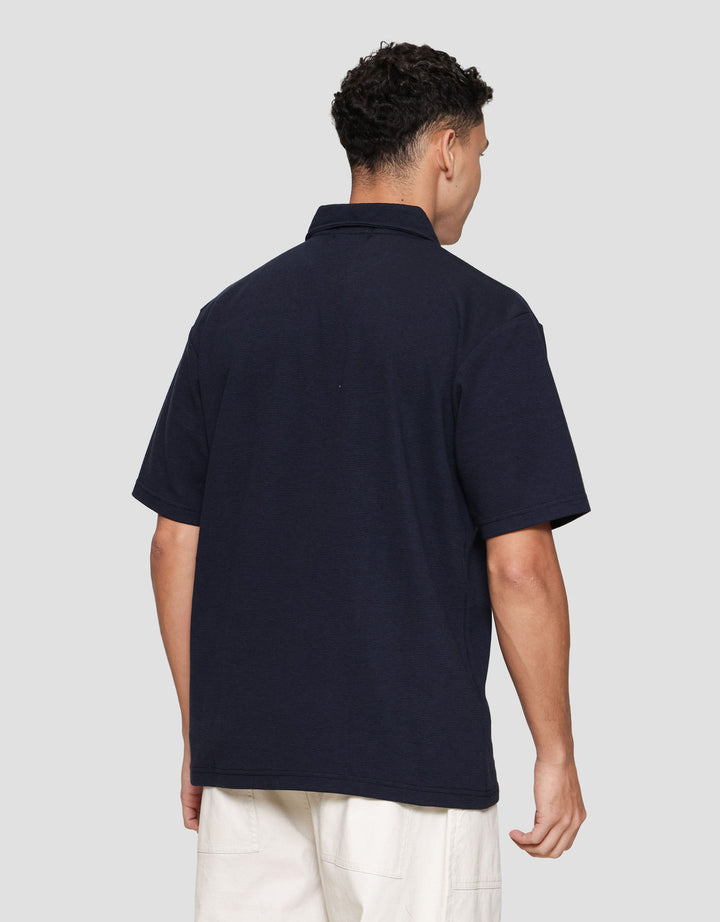 Nevada Plain Texture Polo Pria
