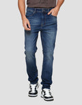 Nevada Spray Washed Tapered Fit Celana Denim pria