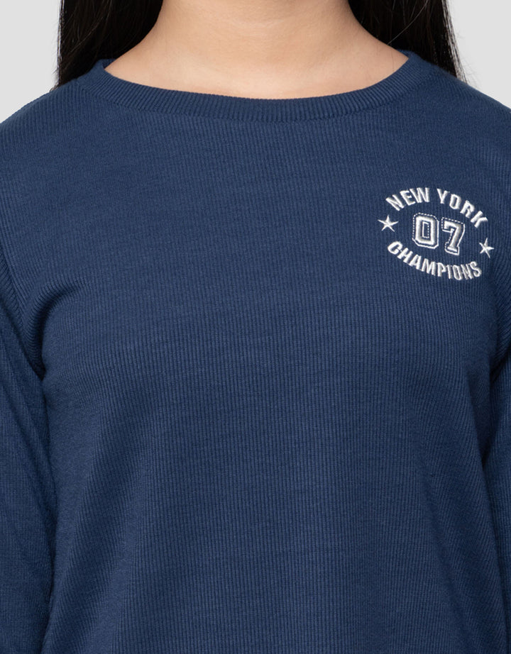 Nevada Rib Ruffle Pinggir Bordir New York Kaos Anak Perempuan