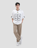 Disney  Os Varsity Buzz Lightyear 95 Performance Kaos Oversize Pria