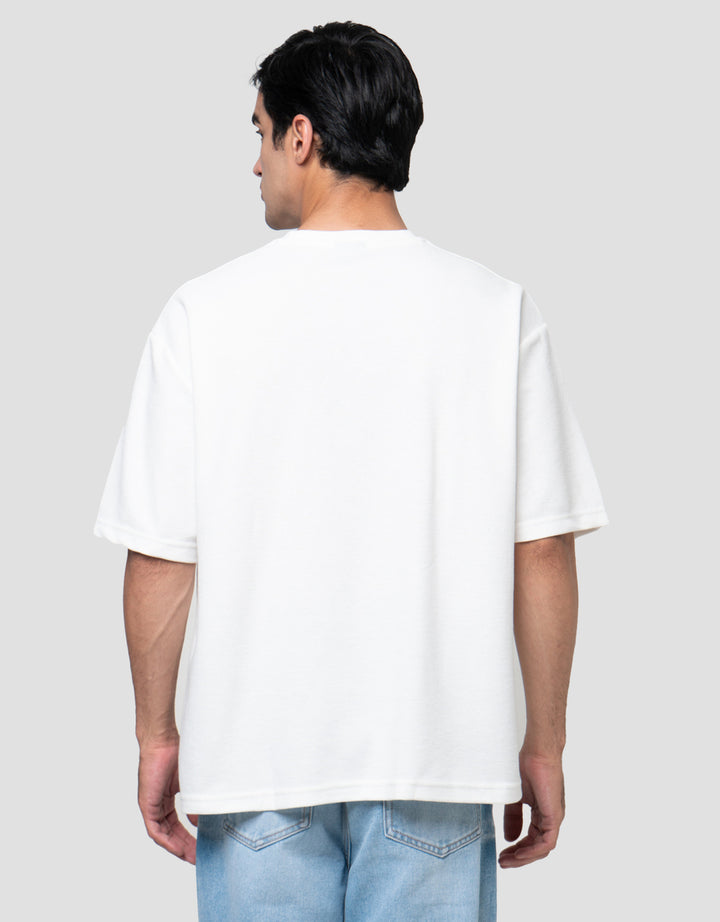 NEVADA WITH EMBRO WORDING STYLE KAOS OVERSIZE PRIA
