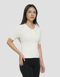 SUKO TEKSTUR POLO WANITA