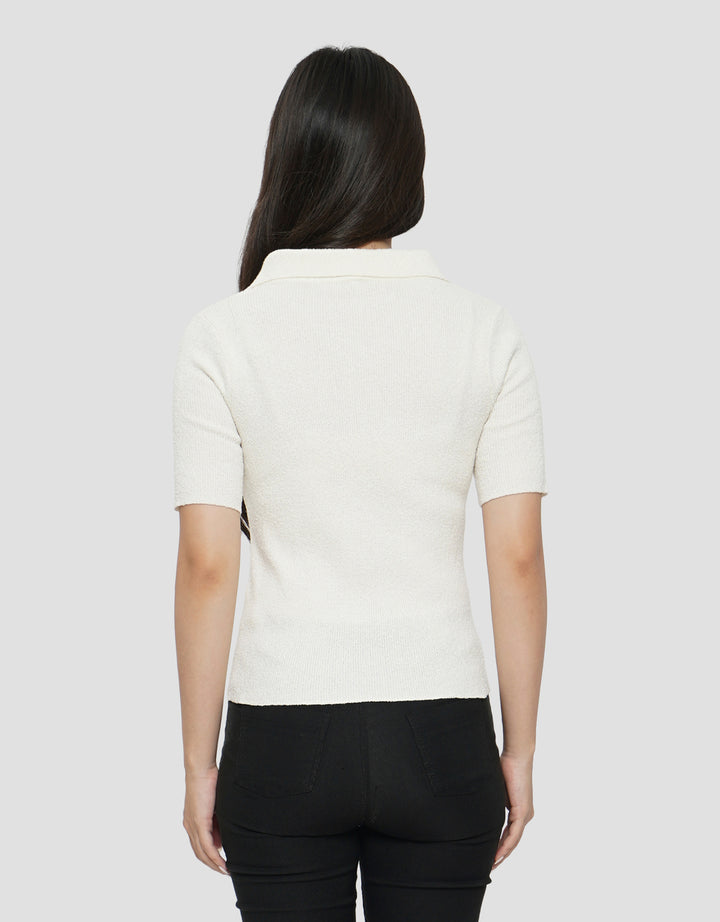 SUKO TEKSTUR POLO WANITA