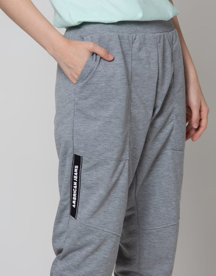 American Jeans Cut Ribbon Jogger Pants Wanita