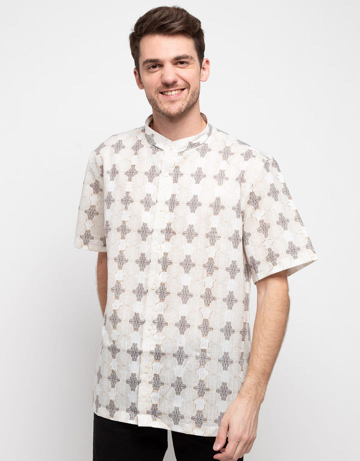 Hassenda Baju Koko Motif Kancing Depan