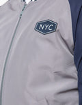 NYLON RAGLAN BOMBER